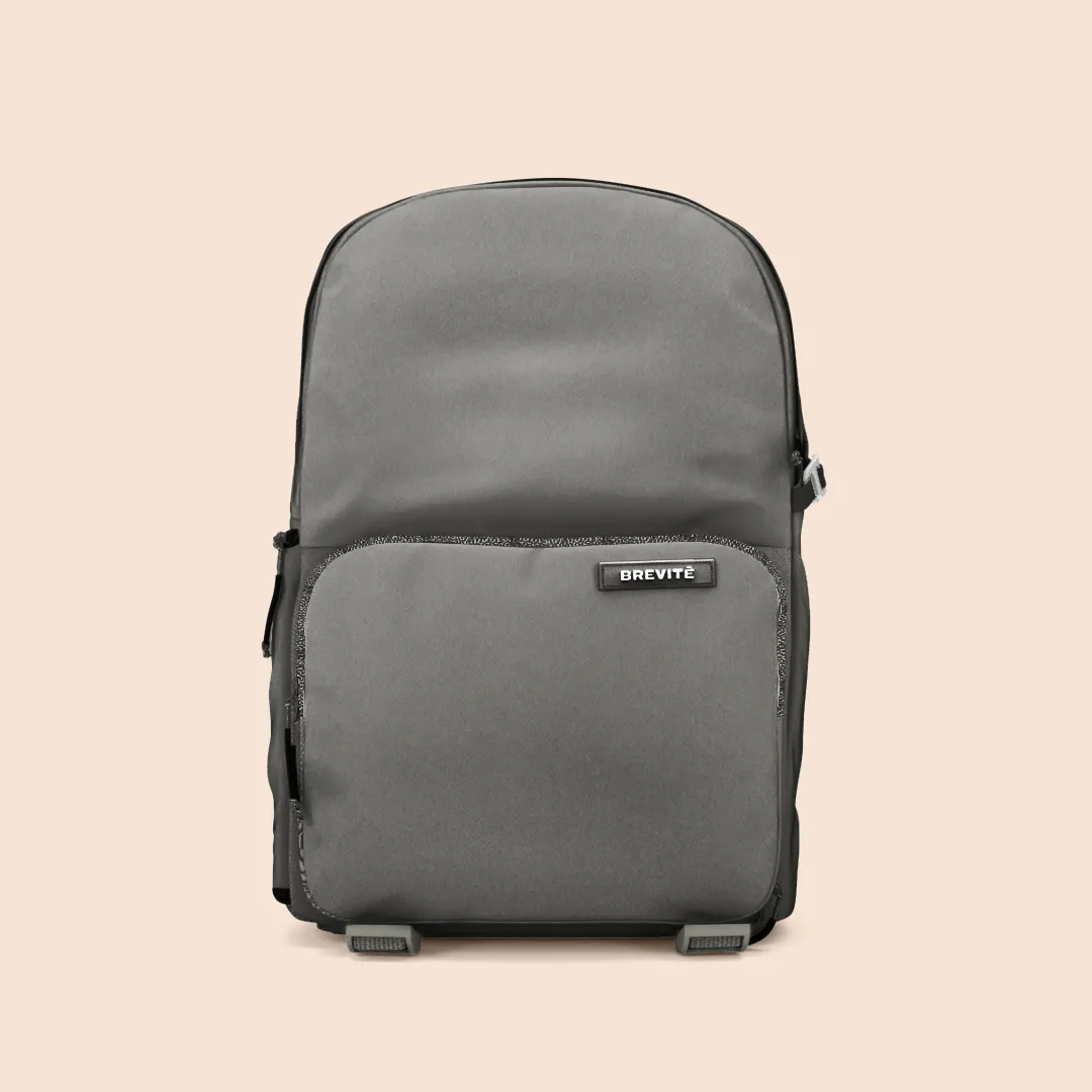 The Brevitē Jumper camera backpack in charcoal grey, front view